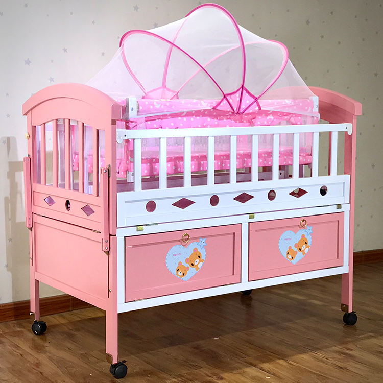 Movable Pink Crib with Drawers