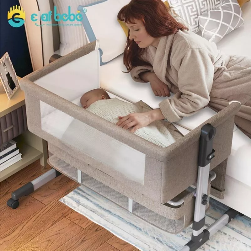 Portable baby crib you can attach to your bed on sale