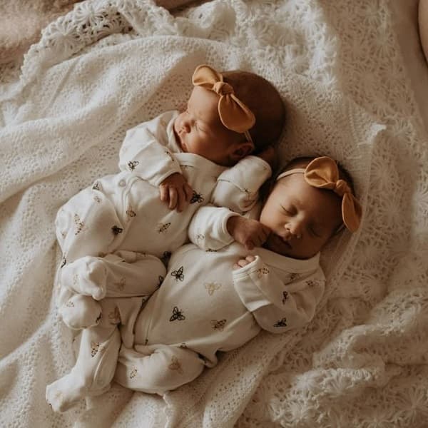 Twins sleeping together